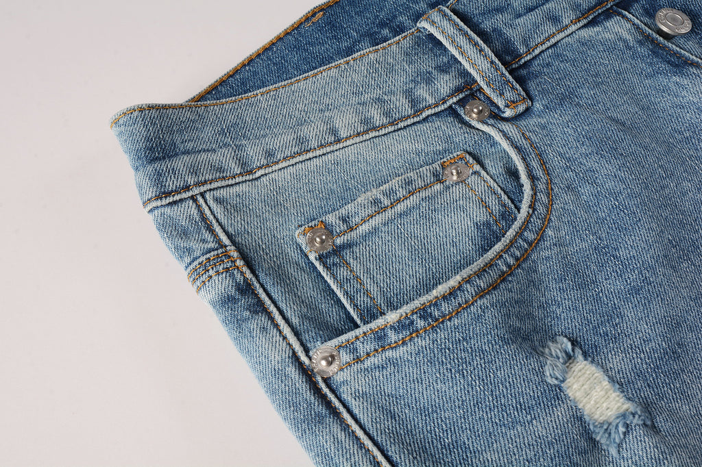 Men's Distressed Slim Fit Light Blue Skinny Jeans with Button Fly & Ripped Detailing