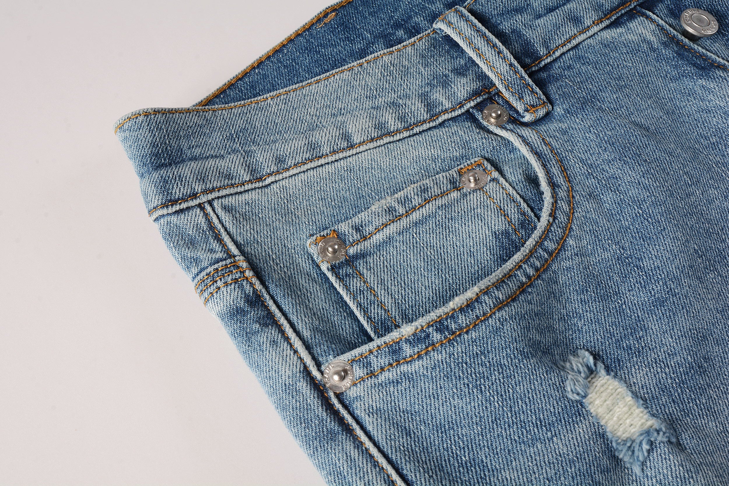 Men's Distressed Slim Fit Light Blue Skinny Jeans with Button Fly & Ripped Detailing