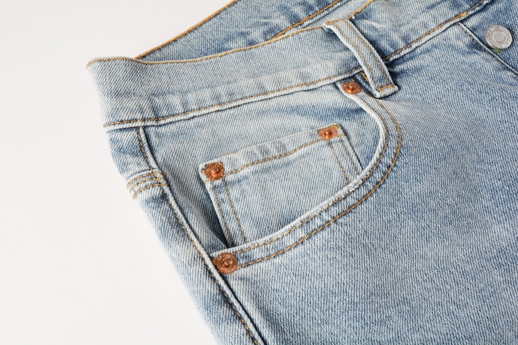 Men's Distressed Light Blue Skinny Jeans with Ripped Holes & Button Fly