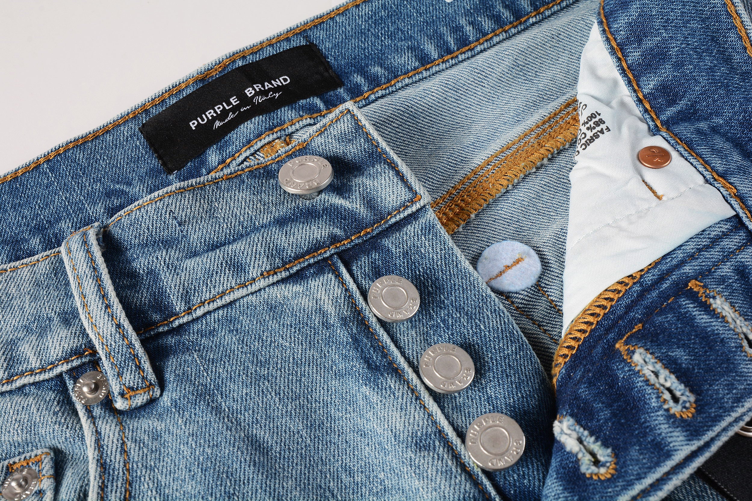 Men's Distressed Slim Fit Light Blue Skinny Jeans with Button Fly & Ripped Detailing