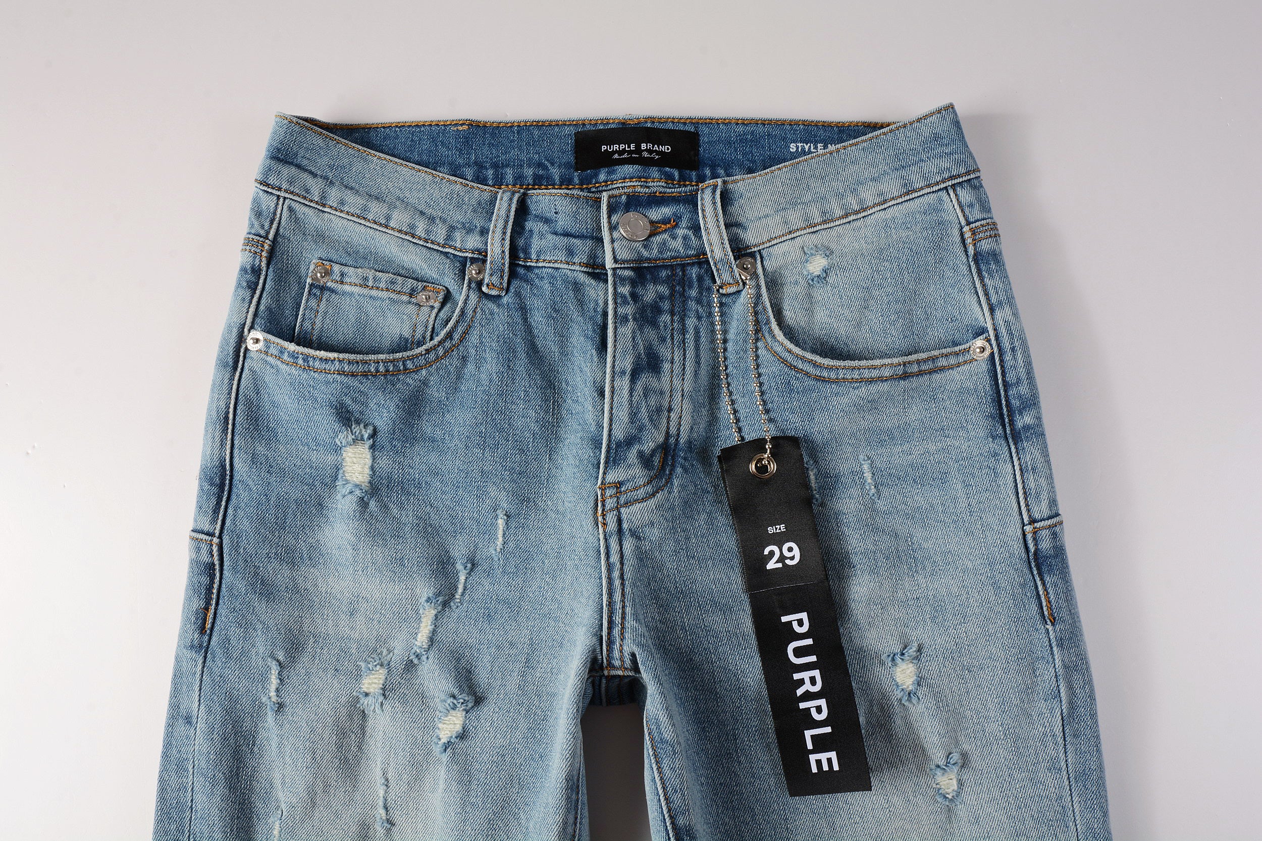 Men's Distressed Slim Fit Light Blue Skinny Jeans with Button Fly & Ripped Detailing
