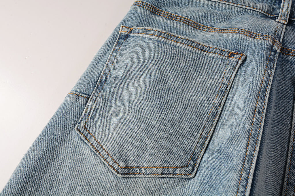 Men's Distressed Slim Fit Light Blue Skinny Jeans with Button Fly & Ripped Detailing