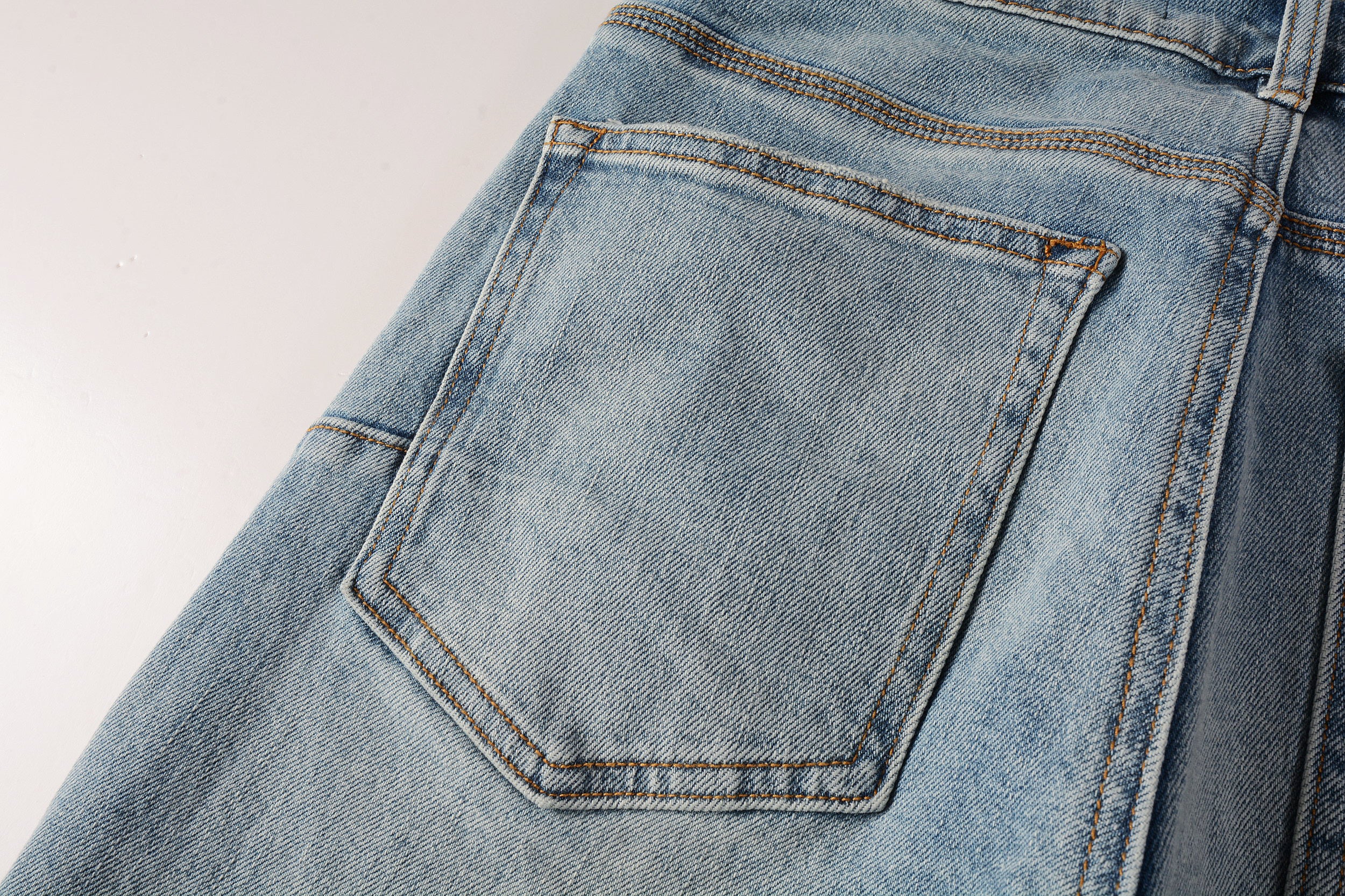 Men's Distressed Slim Fit Light Blue Skinny Jeans with Button Fly & Ripped Detailing