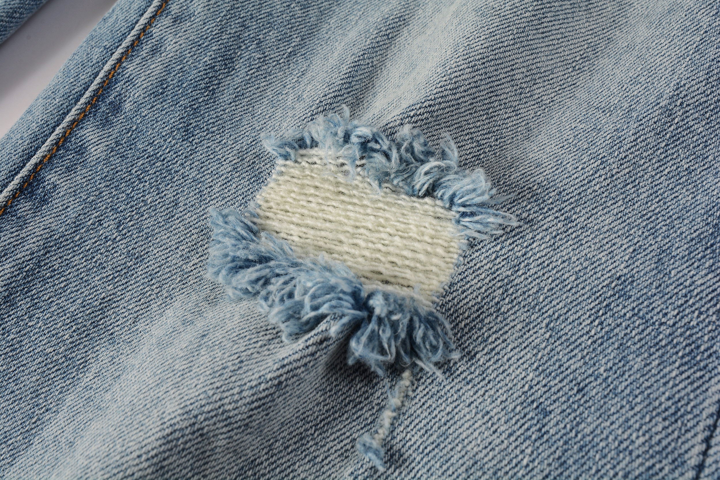 Men's Distressed Slim Fit Light Blue Skinny Jeans with Button Fly & Ripped Detailing