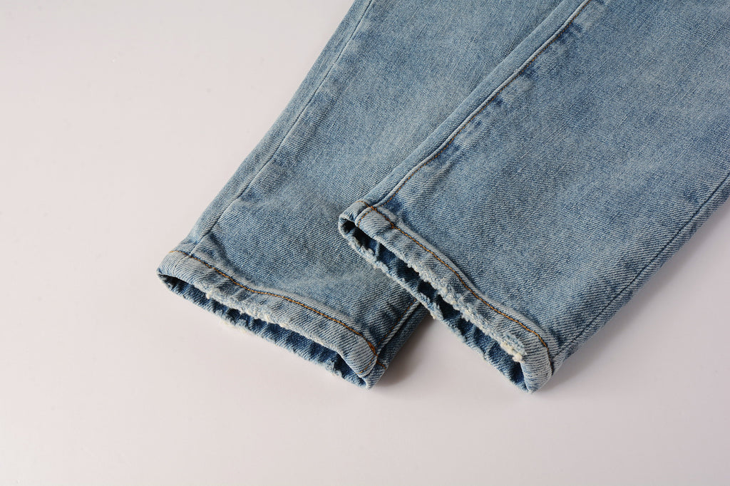 Men's Distressed Slim Fit Light Blue Skinny Jeans with Button Fly & Ripped Detailing