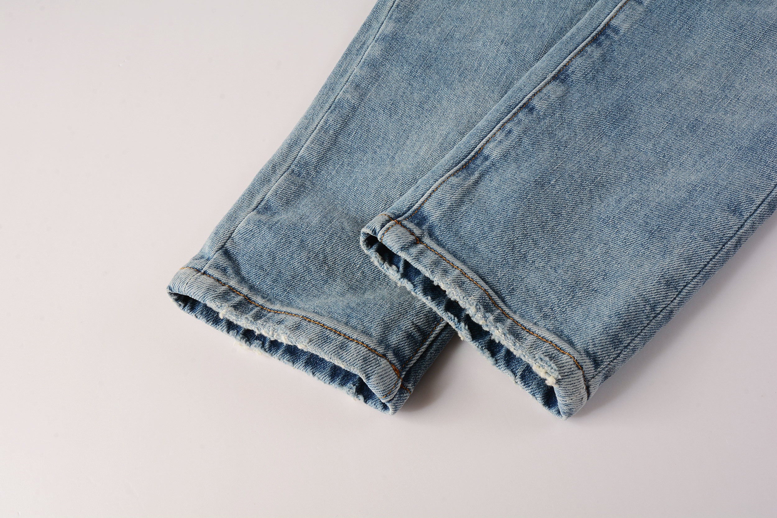 Men's Distressed Slim Fit Light Blue Skinny Jeans with Button Fly & Ripped Detailing