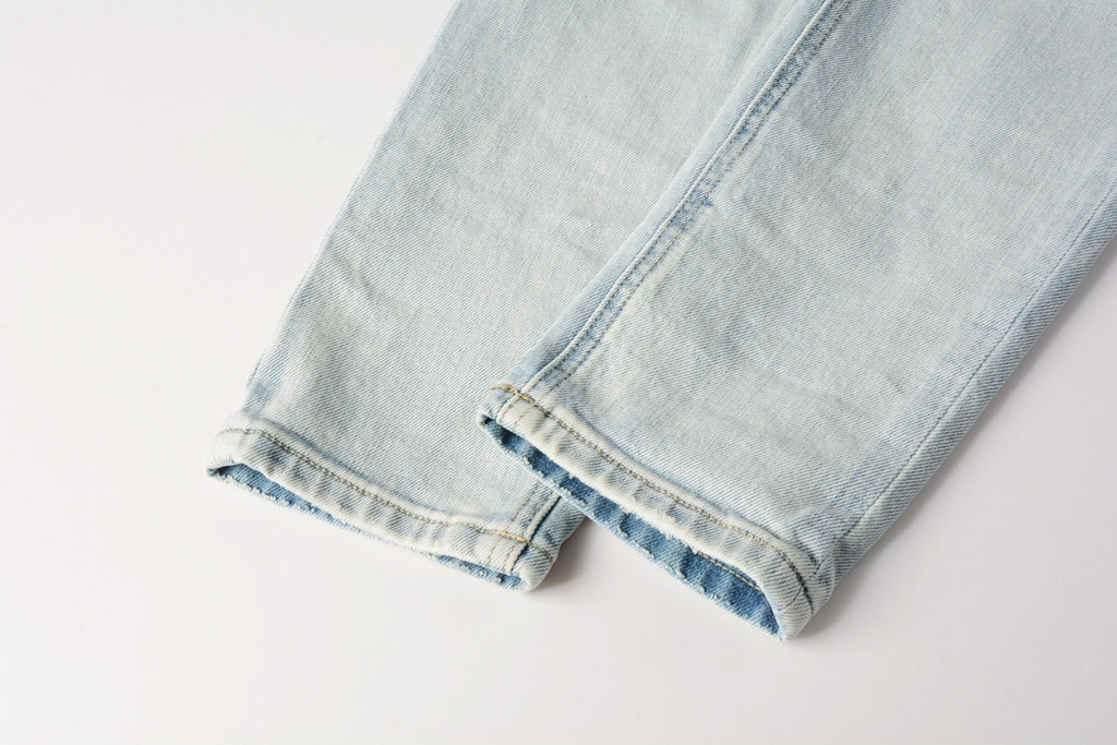 Men's Light Wash Lion Crest Patch Distressed Skinny Jeans - Stretch Denim